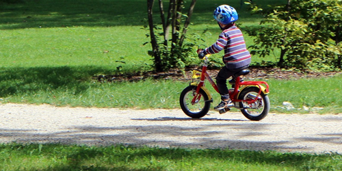 little kid on a bike